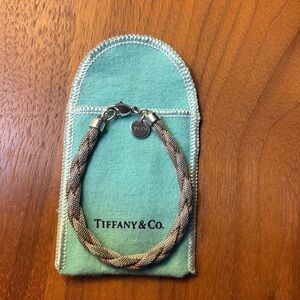 Tiffany & Co. silver mesh braided bracelet.